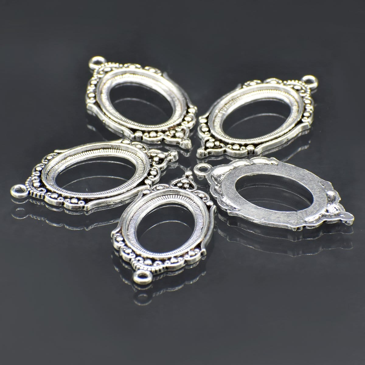 Metal Oval Bezels or Pendants (Pack of 5 pcs) (MC-4328) metal bezels pendants MC 4328 1 metal_bezels_pendants_MC-4328_1