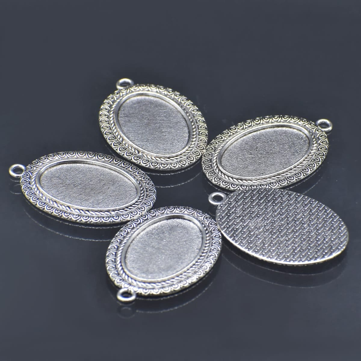 Metal Oval Bezels or Pendants (Pack of 5 pcs) (MC-5317) metal bezels pendants MC 5317 1 metal_bezels_pendants_MC-5317_1