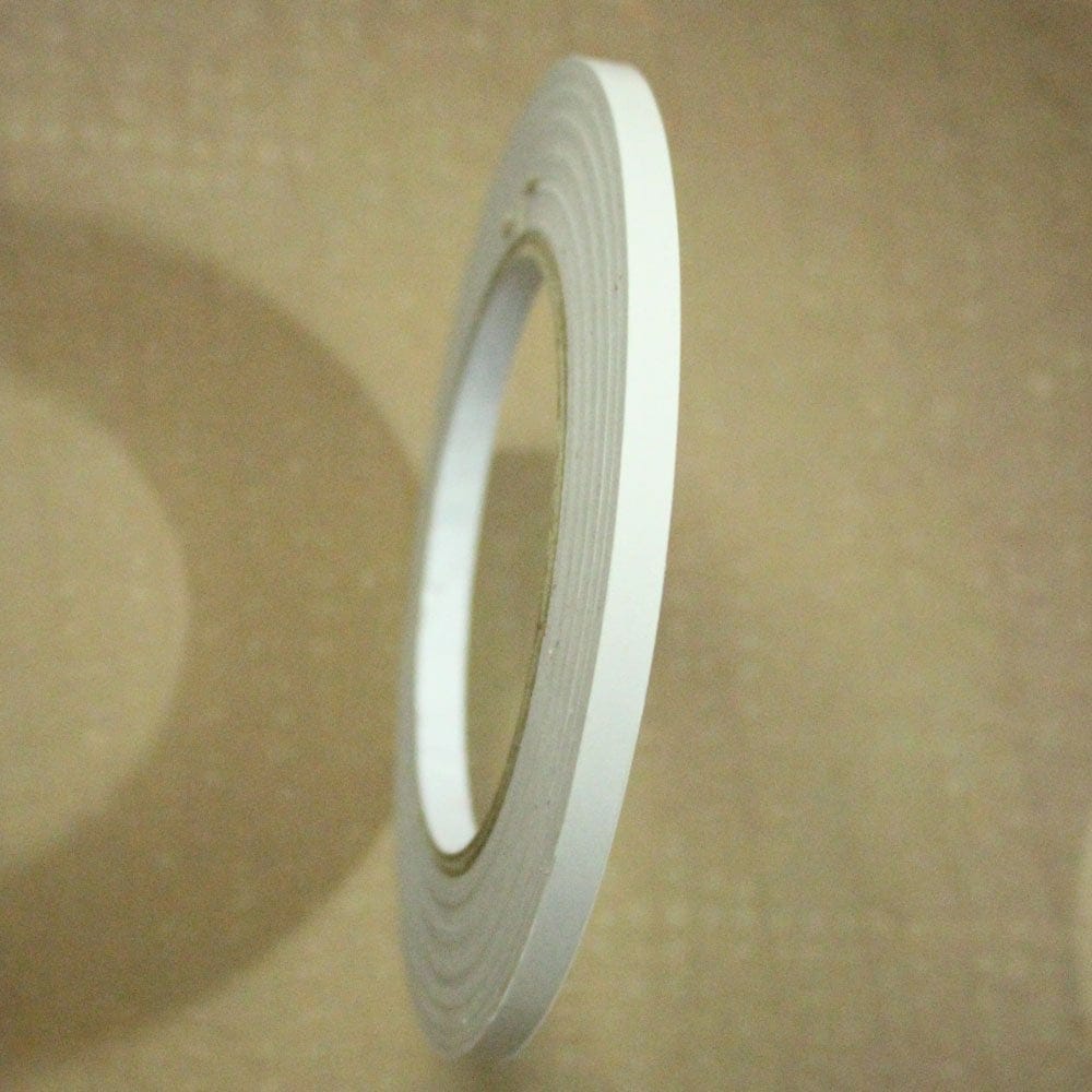 Double Sided tearable scor tape with paper backing (1/4 inch or 6mm by 50 mts) caat 03 double sided terable scor tape Double Sided tearable scor tape with paper backing (1/4 inch or 6mm by 50 mts)