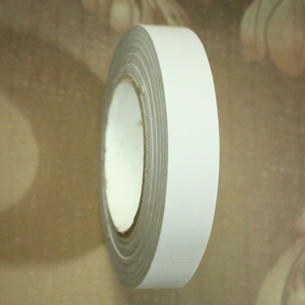 Double Sided tearable scor tape with paper backing (1 inch or 24mm by 50 mts) caat 05 double sided terable scor tape Double Sided tearable scor tape with paper backing (1 inch or 24mm by 50 mts)