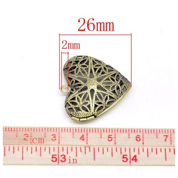 camc-88_metal_heart_carved_lockets_1