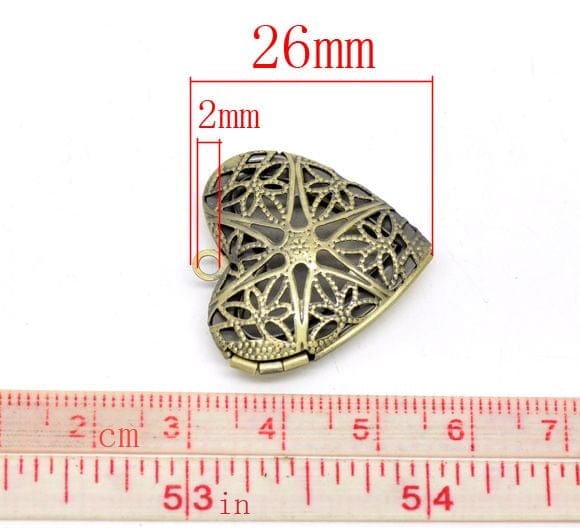 camc-88_metal_heart_carved_lockets_1