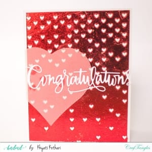 Red foiled Congratulations handmade card with falling hearts