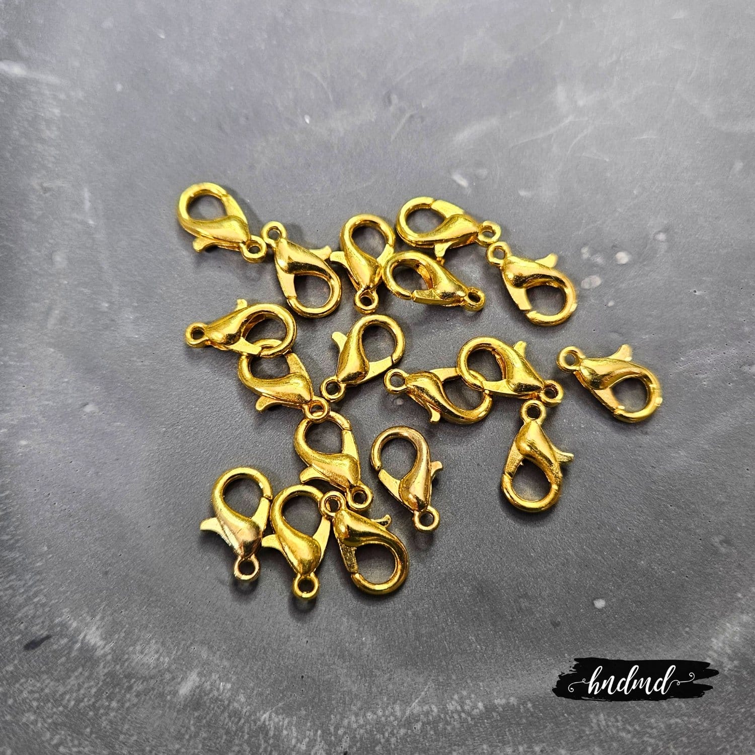 Jewellery Findings - Lobster Locks - 10 mm - Gold (20 pcs) CraftAdda jewellery findings lobster lock gold 1 Jewellery Findings - Lobster Locks - 10 mm - Gold (20 pcs)